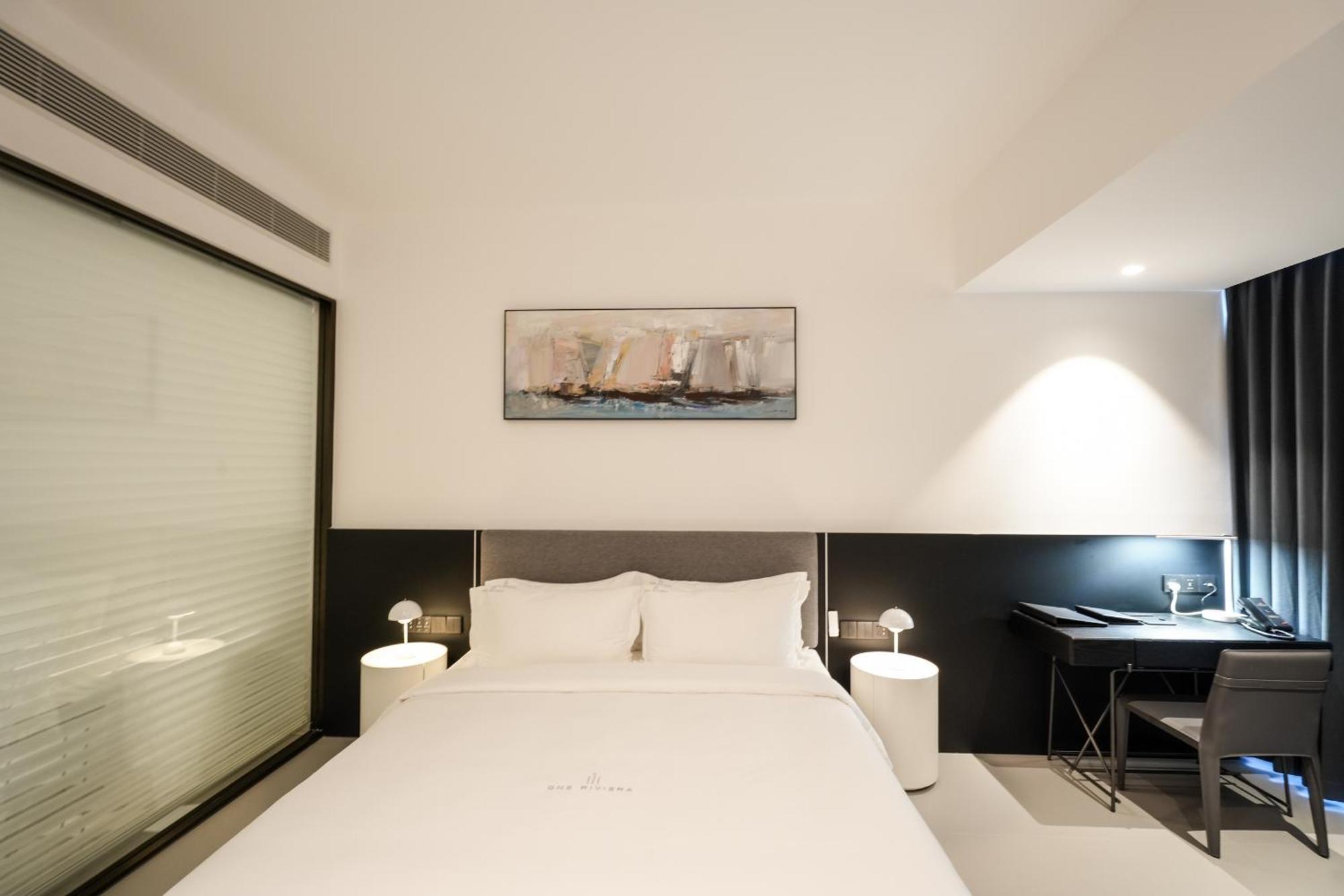 One Riviera Hotel And Residences Ban Souanmone Exterior foto