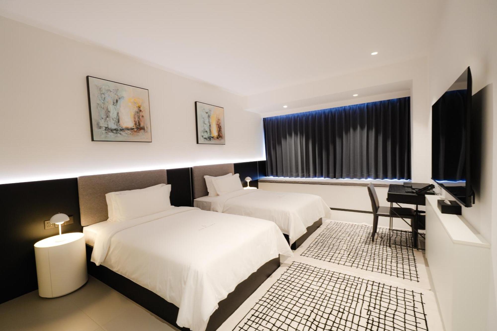 One Riviera Hotel And Residences Ban Souanmone Exterior foto